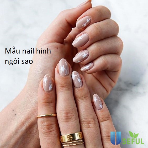 Mẫu nail hình ngôi sao: Tạo ra một mẫu vẽ nail đẹp mắt với hình dáng ngôi sao là điều rất dễ dàng, mang lại cho bạn cảm giác tự tin và quyến rũ. Những gam màu và sự kết hợp với các hoạ tiết khác sẽ giúp bộ nail trở nên sinh động và ấn tượng hơn.