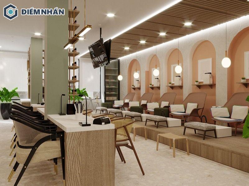 Nội thất sử dụng gam màu trắng và vàng đồng bộ với tông màu chủ đạo của tiệm